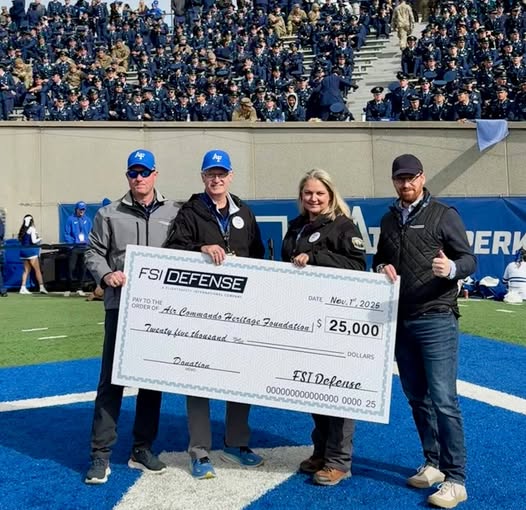 FlightSafety International donation presentation at Air Force vs Army game